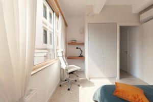 Posteľ alebo postele v izbe v ubytovaní The Marble Suites, PLAKA