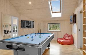 a billiard room with a pool table in it at Pet Friendly Home In lbk With Sauna in Ålbæk