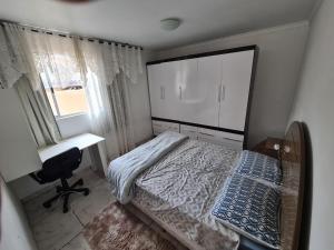 Cama o camas de una habitación en Hostel AJBJ Turismo
