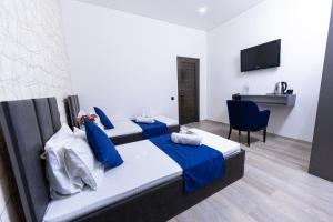 Postelja oz. postelje v sobi nastanitve Bloom Hotel Yerevan
