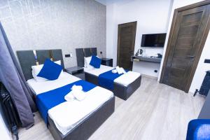 Postelja oz. postelje v sobi nastanitve Bloom Hotel Yerevan