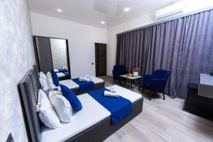 Postelja oz. postelje v sobi nastanitve Bloom Hotel Yerevan