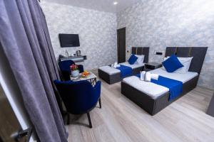 TV in/ali zabaviščno središče v nastanitvi Bloom Hotel Yerevan