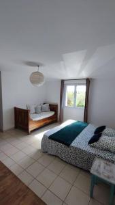 Posteľ alebo postele v izbe v ubytovaní Appartement dans Mas camarguais