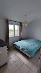 Posteľ alebo postele v izbe v ubytovaní Appartement dans Mas camarguais + 4 fotografie