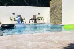 Fotografie z fotogalerie ubytování Villa Estrella 3Br- Pool -WiFi-BBQ-Free Parking v destinaci Santiago de los Caballeros