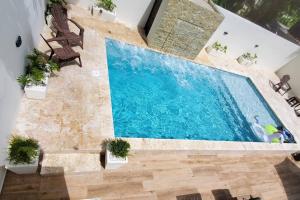 Fotografie z fotogalerie ubytování Villa Estrella 3Br- Pool -WiFi-BBQ-Free Parking v destinaci Santiago de los Caballeros