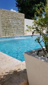 Fotografie z fotogalerie ubytování Villa Estrella 3Br- Pool -WiFi-BBQ-Free Parking v destinaci Santiago de los Caballeros