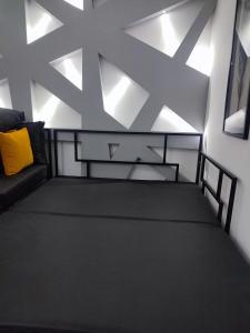Triangle studio Divcibare 객실 침대