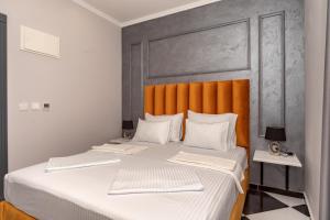 Voodi või voodid majutusasutuse Baba's Hotel & Spa toas