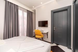 Voodi või voodid majutusasutuse Baba's Hotel & Spa toas