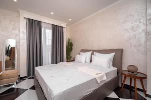 Voodi või voodid majutusasutuse Baba's Hotel & Spa toas