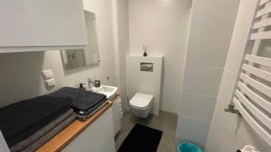 Kúpeľňa v ubytovaní Apartament nad jeziorem , ZEFIR