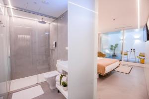 Kúpeľňa v ubytovaní Apartamentos Atia Catedral + 37 fotografií