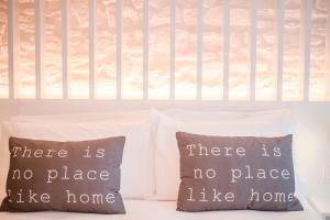 Posteľ alebo postele v izbe v ubytovaní Apartamentos Atia Catedral