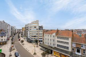 a view of a city with buildings and a street at Viviane - Beautifull view, Garage, 200m from beach in De Panne