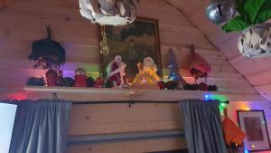 a room with a shelf with figurines on it at BL Beskydy Lodge in Prostřední Bečva +108 photos