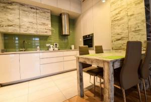 Kuchyňa alebo kuchynka v ubytovaní ApartmentPrestige Central Station