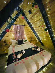 a bedroom with two beds in a tree house at Garden Bungalows and Suites in Antalya +84 photos