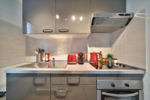 Kuchyňa alebo kuchynka v ubytovaní Charmant appartement hypercentre