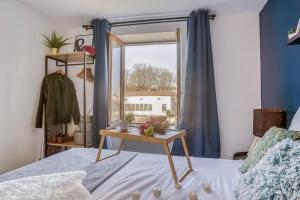 Posteľ alebo postele v izbe v ubytovaní Charmant appartement hypercentre