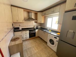 Kuchyň nebo kuchyňský kout v ubytování Apartamentos Atlas Terrassa V