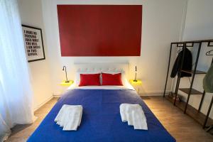 Postel nebo postele na pokoji v ubytování Pop Art Corso Italia 308