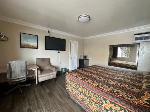 Postel nebo postele na pokoji v ubytování Flamingo Motel Oxnard