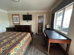 Postel nebo postele na pokoji v ubytování Flamingo Motel Oxnard