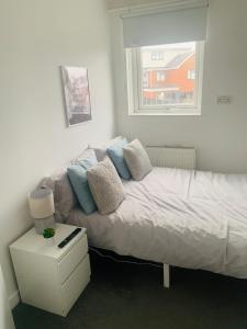 Llit o llits en una habitació de Greenshaw 3 Bedroom Terrace