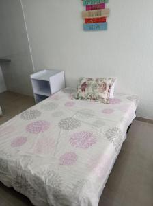 Postel nebo postele na pokoji v ubytování Hotel Bogotá Calle 100