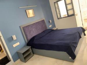 Postel nebo postele na pokoji v ubytování Green Serene Abode