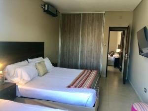 Giường trong phòng chung tại San Lorenzo Premium +26 ảnh