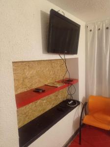 TV a/nebo společenská místnost v ubytování Hotel Bogotá Calle 100