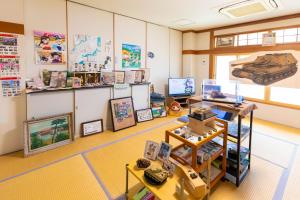 Sjónvarps- og/eða afþreyingartæki á とびた荘 #小学生以下は宿泊不可#