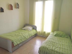 Posteľ alebo postele v izbe v ubytovaní Charmant 4 pièces à Sète avec balcon, proche plage, activités familiales et commodités - FR-1-338-509