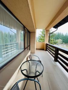 Balkón nebo terasa v ubytování Pensiunea Zimbrul