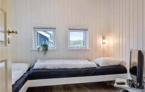 Postel nebo postele na pokoji v ubytování Holiday Home Bjerregårdsvej Vi