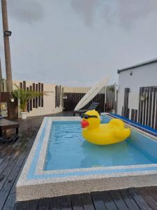 Bazén v ubytování 墾丁夏旅Villa-可包棟 nebo v jeho okolí + 17 fotografií
