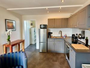 Kuchyň nebo kuchyňský kout v ubytování Geschmackvolle Ferienwohnung in Markkleeberg