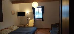 Postel nebo postele na pokoji v ubytování Apartments Anna