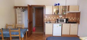 Kuchyň nebo kuchyňský kout v ubytování Apartments Anna
