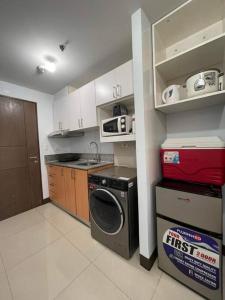 Η κουζίνα ή μικρή κουζίνα στο Cubao Manhattan, U 8J T D,Studio +10 φωτογραφίες
