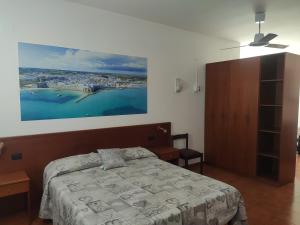 A bed or beds in a room at Residence Stella Maris