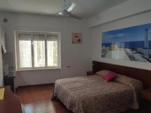 A bed or beds in a room at Residence Stella Maris