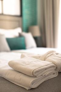 Postel nebo postele na pokoji v ubytování Hotel Casa di Sofia