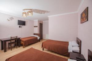 מיטה או מיטות בחדר ב-Hillside Resort Telavi