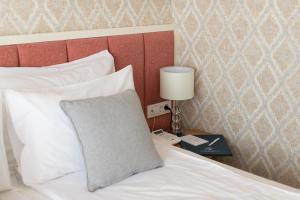 Postel nebo postele na pokoji v ubytování Hotel Casa di Sofia