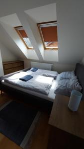 Posteľ alebo postele v izbe v ubytovaní Mýto Apartments BERGMAX, Ski Jasná Chopok 10min transit - Resort Mýto Apartments, parking free