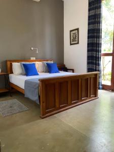 Postel nebo postele na pokoji v ubytování Lake View Colombo Nawala